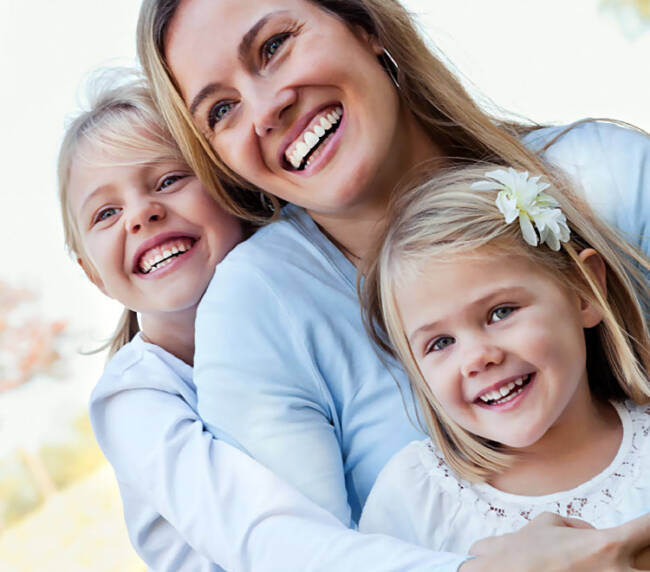 Happy mother daughters