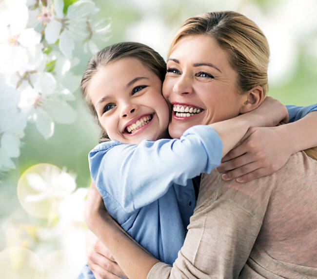 Smiling mother daughter